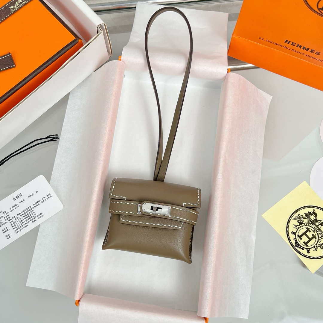 Hermes H084665CK0U Kellyfestival charm Kelly bag charm in Swift calfskin H88909