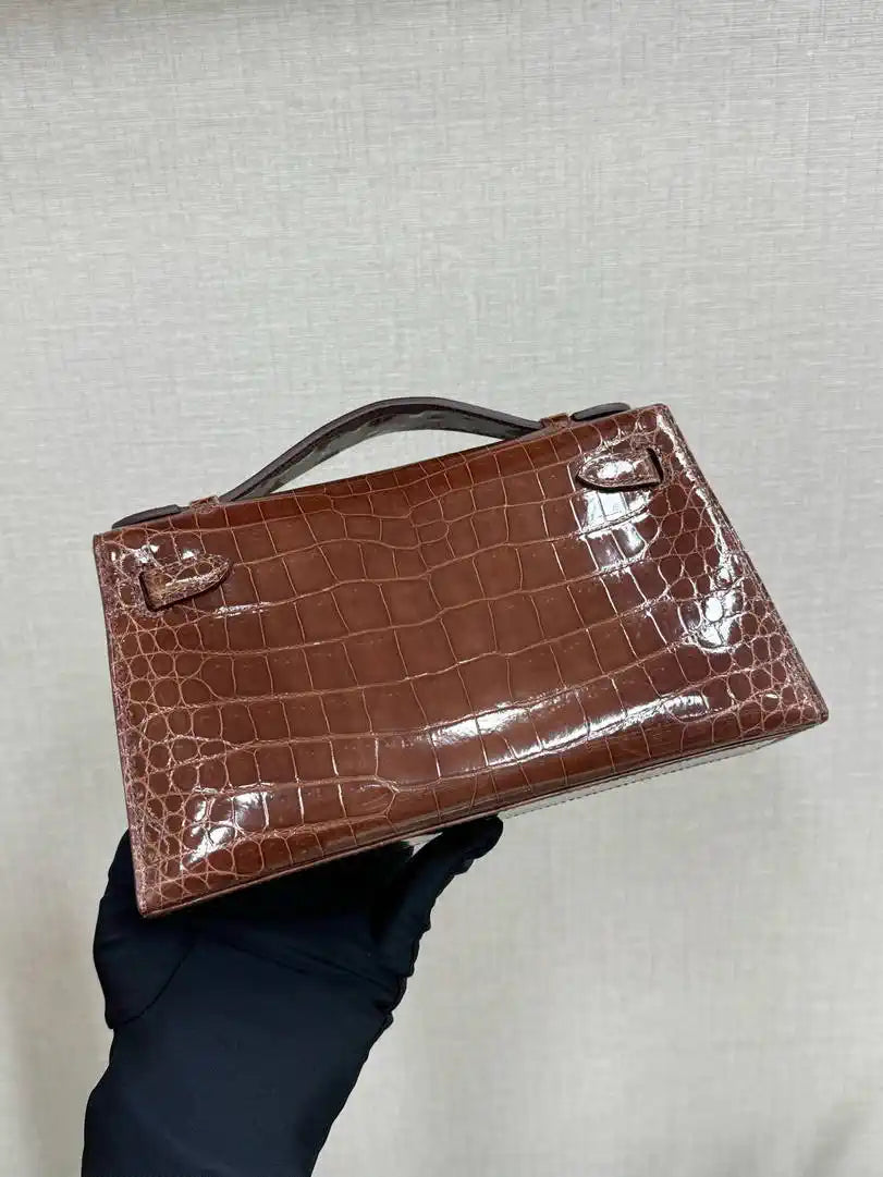 Hermes Kelly Pouchette Glossy crocodile Leather clutch bag H231029