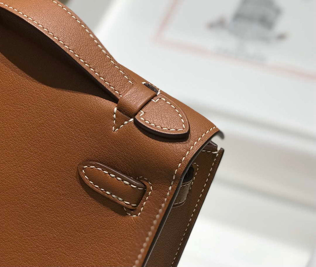 Hermes Kelly Pouchette Swift Leather clutch bag Gold H230265