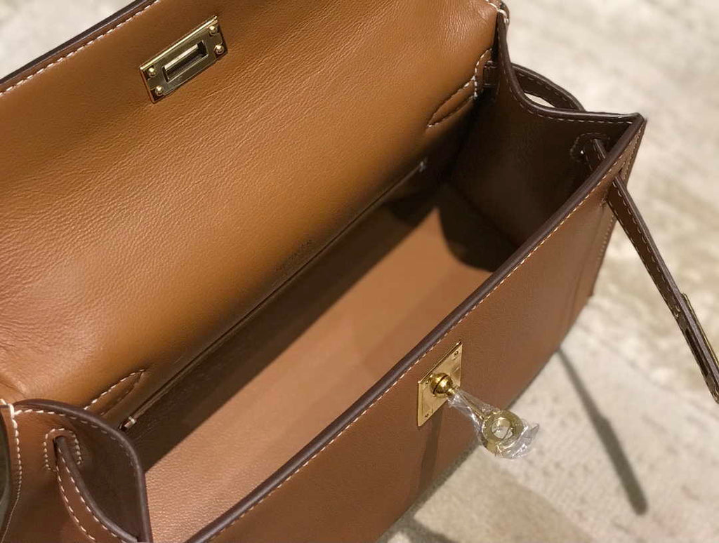 Hermes Kelly Pouchette Swift Leather clutch bag Gold H230265