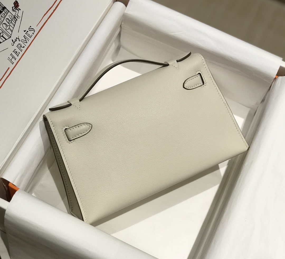Hermes Kelly Pouchette Swift Leather clutch bag Gold H230266