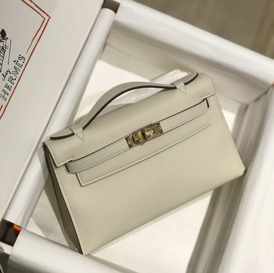 Hermes Kelly Pouchette Swift Leather clutch bag Gold H230266