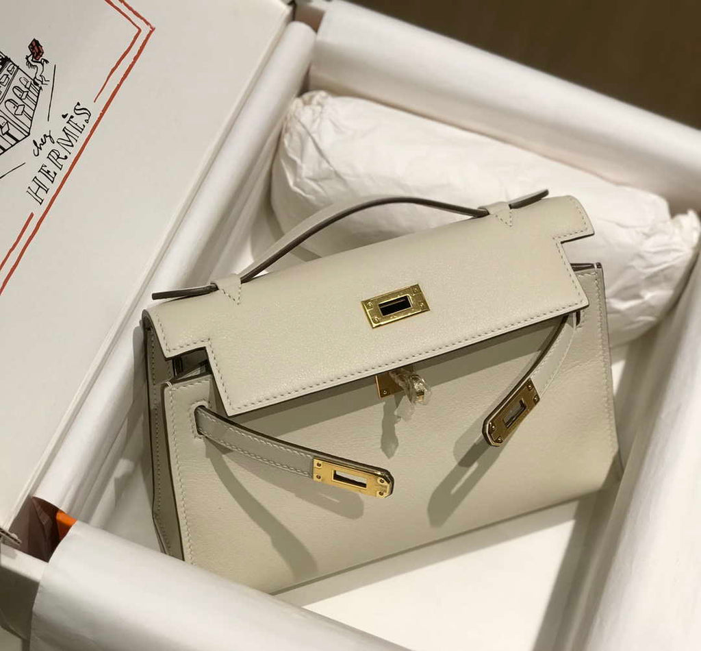 Hermes Kelly Pouchette Swift Leather clutch bag Gold H230266