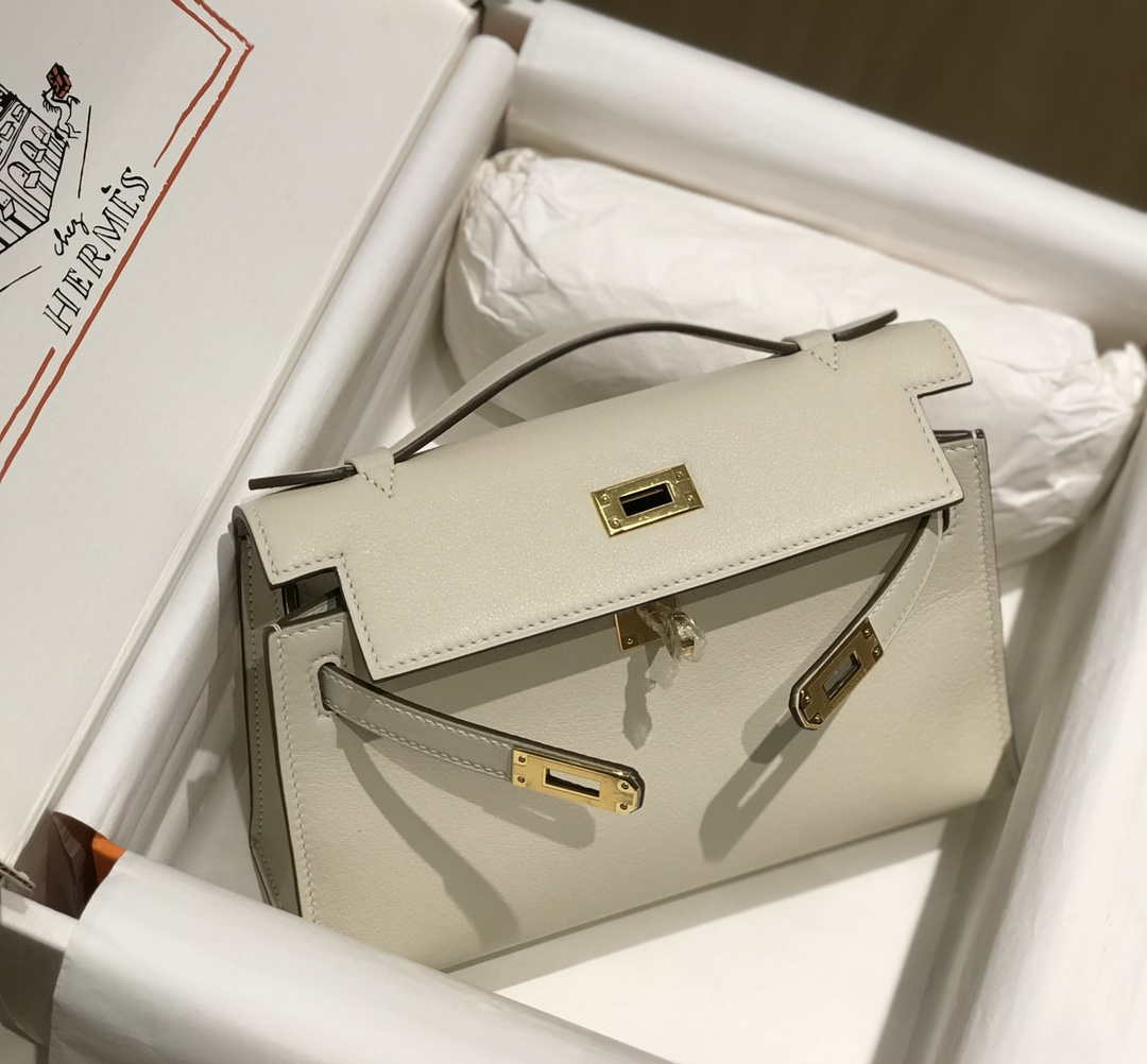 Hermes Kelly Pouchette Swift Leather clutch bag Gold H230266