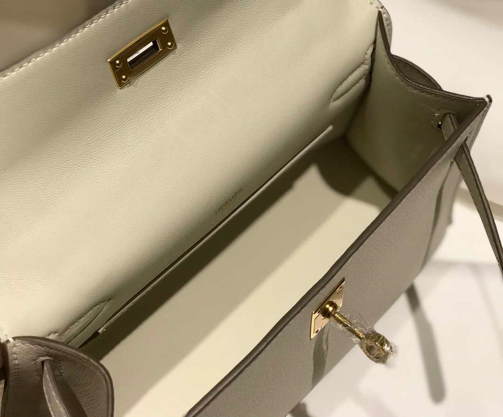 Hermes Kelly Pouchette Swift Leather clutch bag Gold H230266
