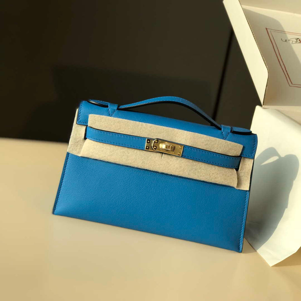 Hermes Kelly Pouchette Swift Leather clutch bag Gold H230267