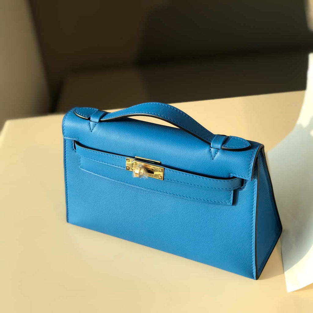 Hermes Kelly Pouchette Swift Leather clutch bag Gold H230267