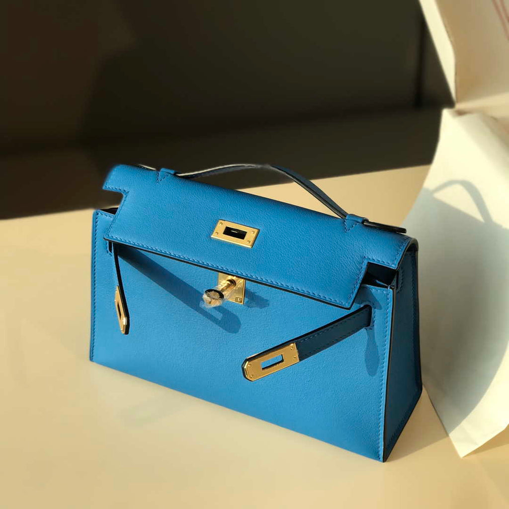 Hermes Kelly Pouchette Swift Leather clutch bag Gold H230267