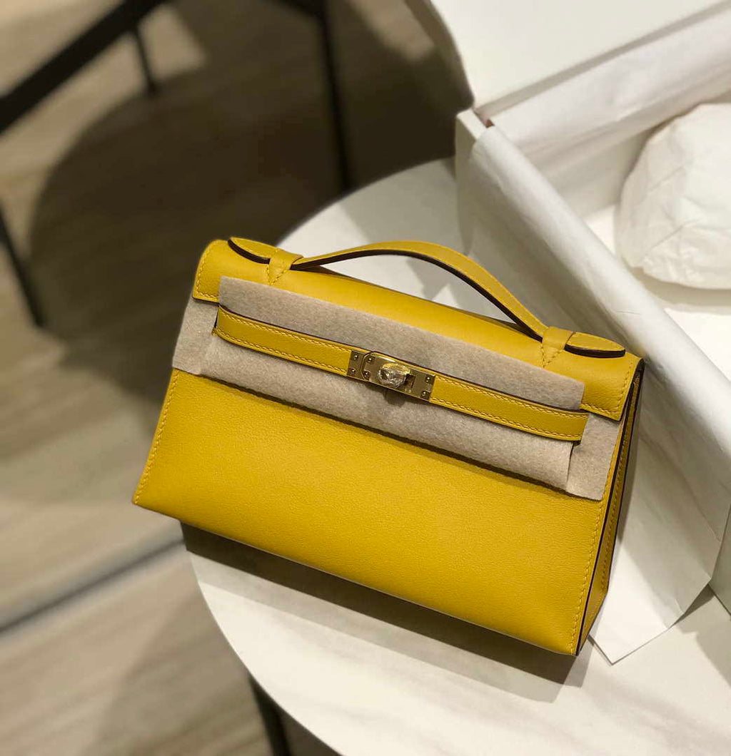 Hermes Kelly Pouchette Swift Leather clutch bag Gold H230269