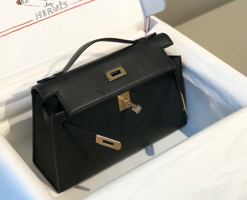 Hermes Kelly Pouchette Swift Leather clutch bag Gold H230270