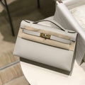 Hermes Kelly Pouchette Swift Leather clutch bag Gold H230271 - Default Title - View 1