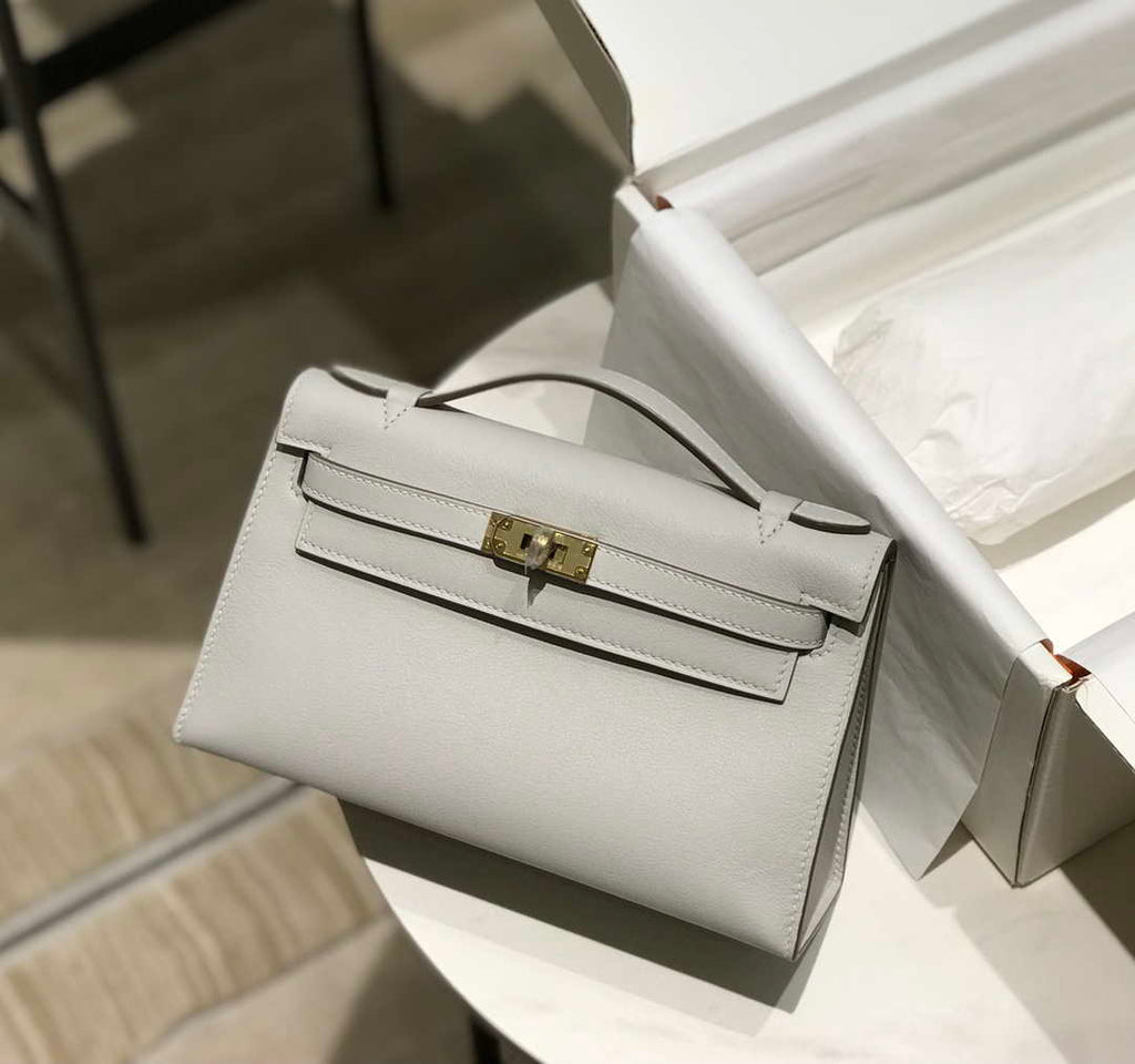 Hermes Kelly Pouchette Swift Leather clutch bag Gold H230271