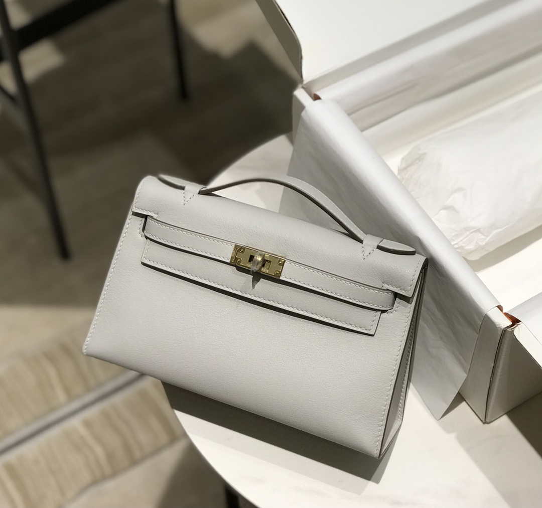 Hermes Kelly Pouchette Swift Leather clutch bag Gold H230271