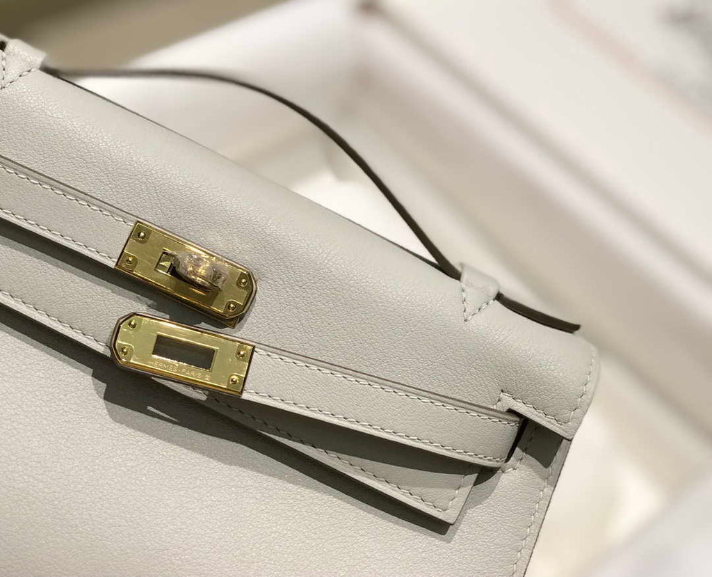 Hermes Kelly Pouchette Swift Leather clutch bag Gold H230271
