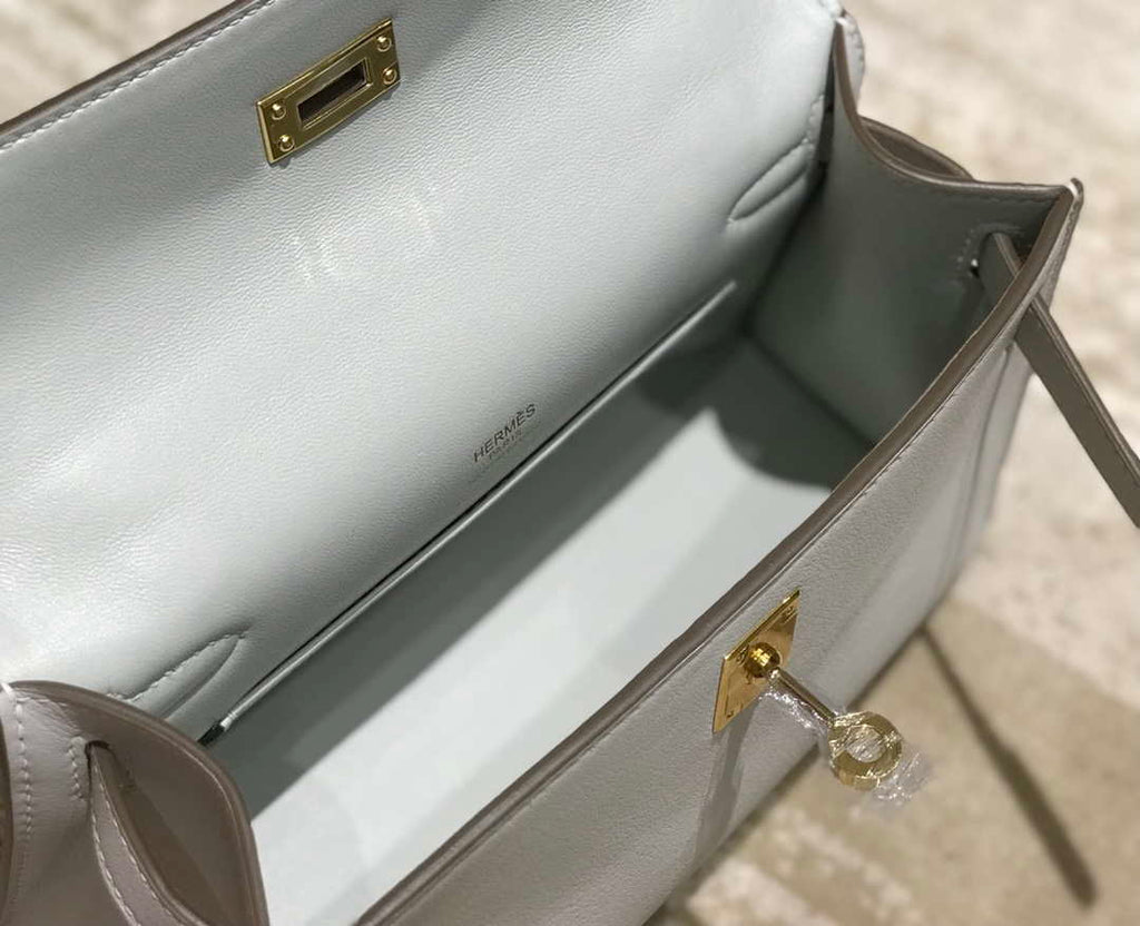 Hermes Kelly Pouchette Swift Leather clutch bag Gold H230271