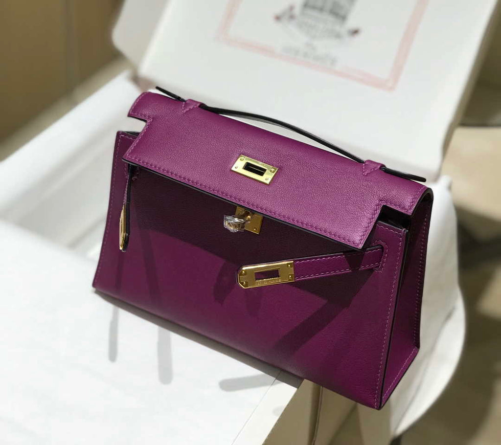 Hermes Kelly Pouchette Swift Leather clutch bag Gold H230273