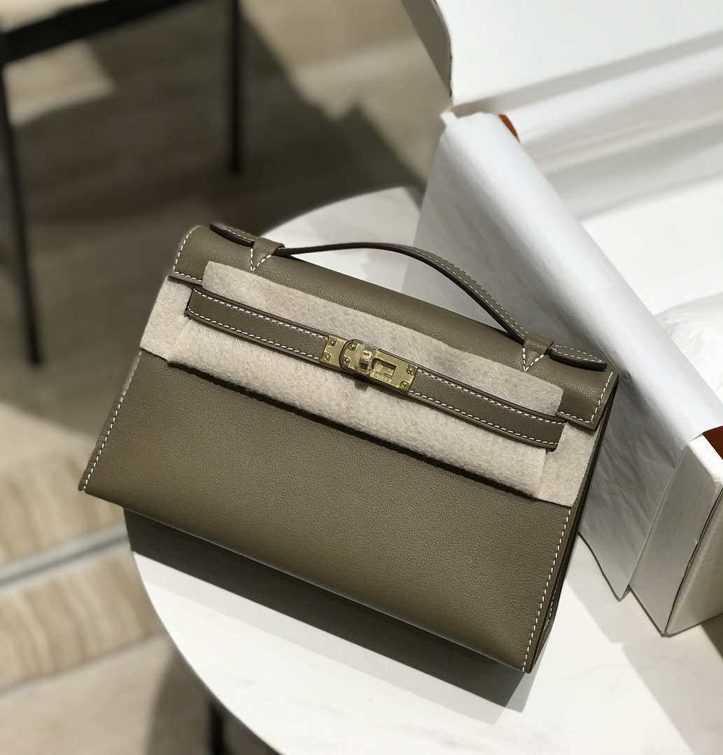 Hermes Kelly Pouchette Swift Leather clutch bag Gold H230274 - Default Title - View 1