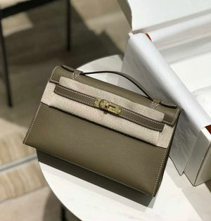 Hermes Kelly Pouchette Swift Leather clutch bag Gold H230274 - Default Title - View 1