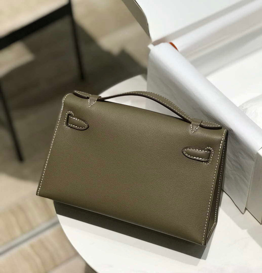 Hermes Kelly Pouchette Swift Leather clutch bag Gold H230274
