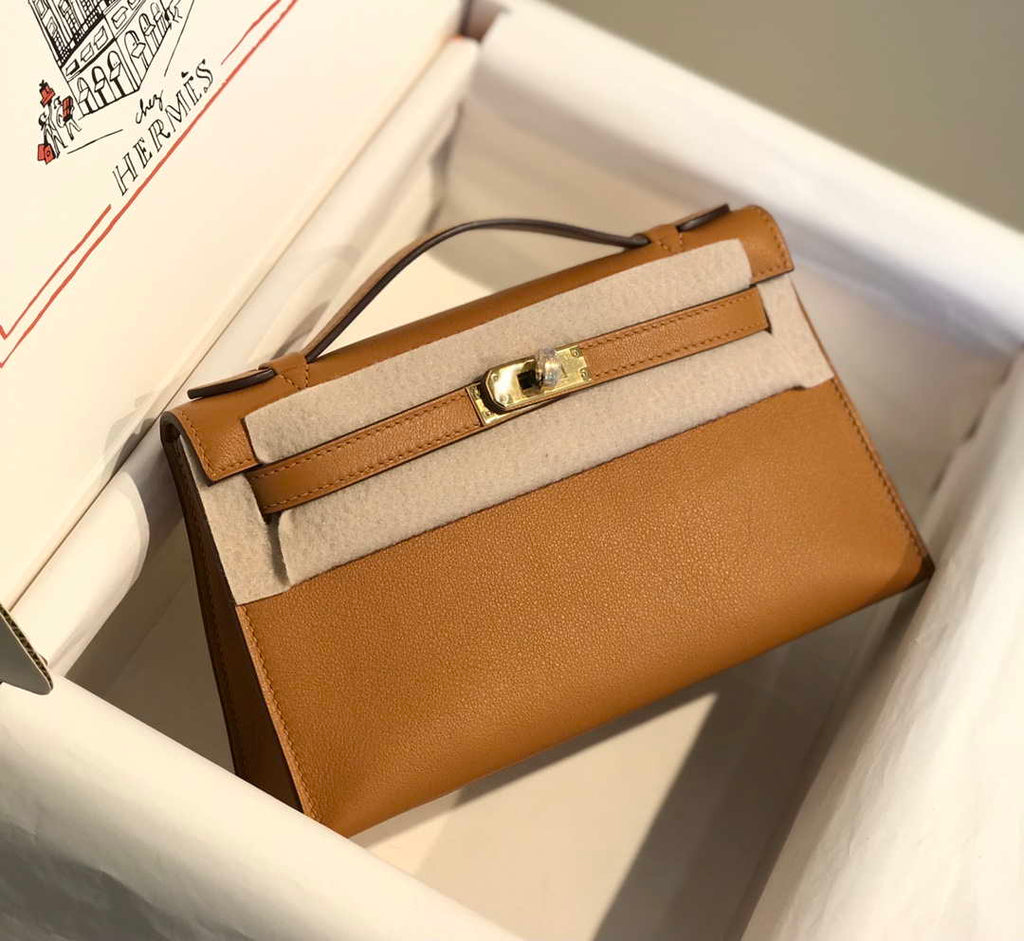 Hermes Kelly Pouchette Swift Leather clutch bag Gold H230276