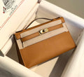 Hermes Kelly Pouchette Swift Leather clutch bag Gold H230276