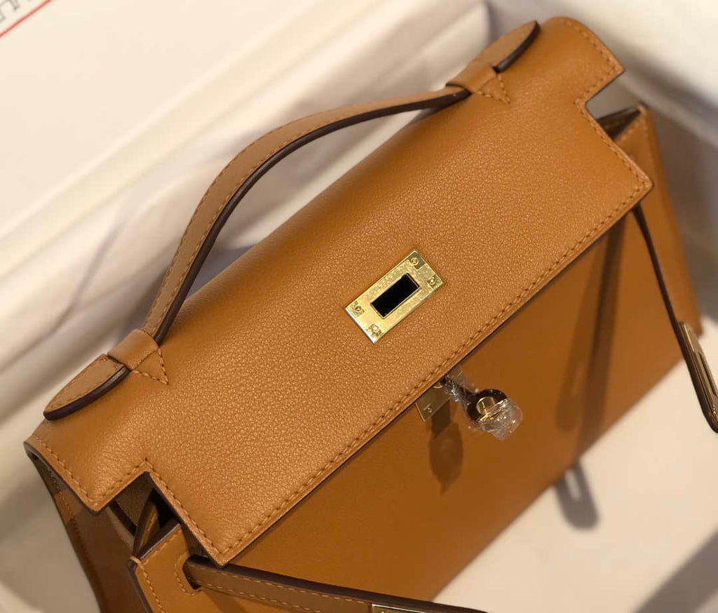 Hermes Kelly Pouchette Swift Leather clutch bag Gold H230276