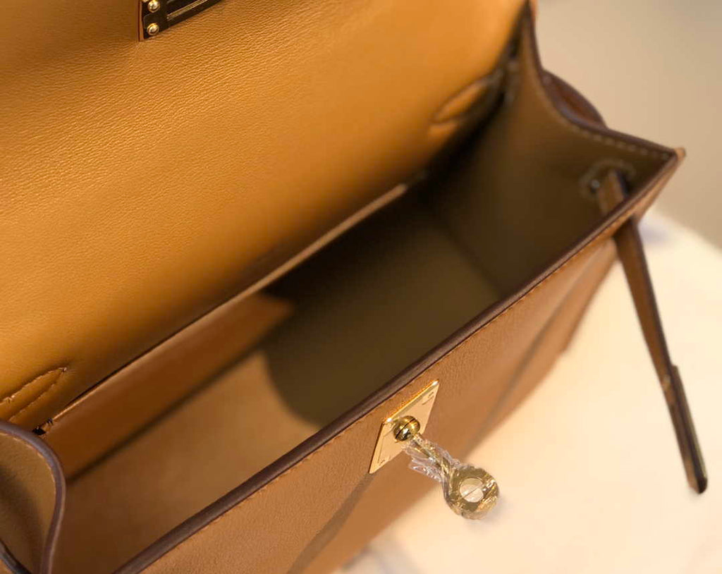 Hermes Kelly Pouchette Swift Leather clutch bag Gold H230276