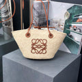 Loewe 169470054 LOEWE x Paula's Ibiza Anagram Small Basket Bag in Iraca Palm with Leather Handles Tan - Default Title - View 1
