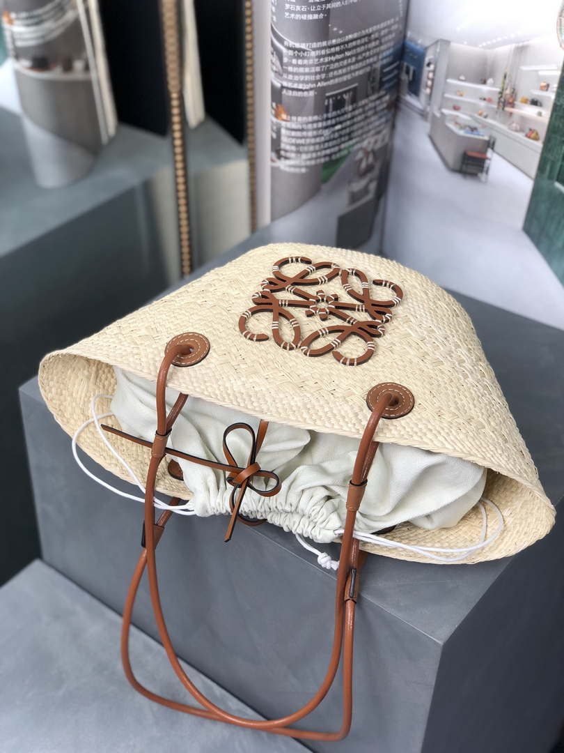 Loewe 169470054 LOEWE x Paula's Ibiza Anagram Small Basket Bag in Iraca Palm with Leather Handles Tan
