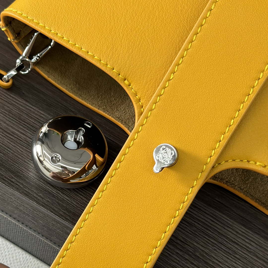 Loewe AANBBBMX01 Mini Pebble Bucket Bag in mellow calfskin Yellow