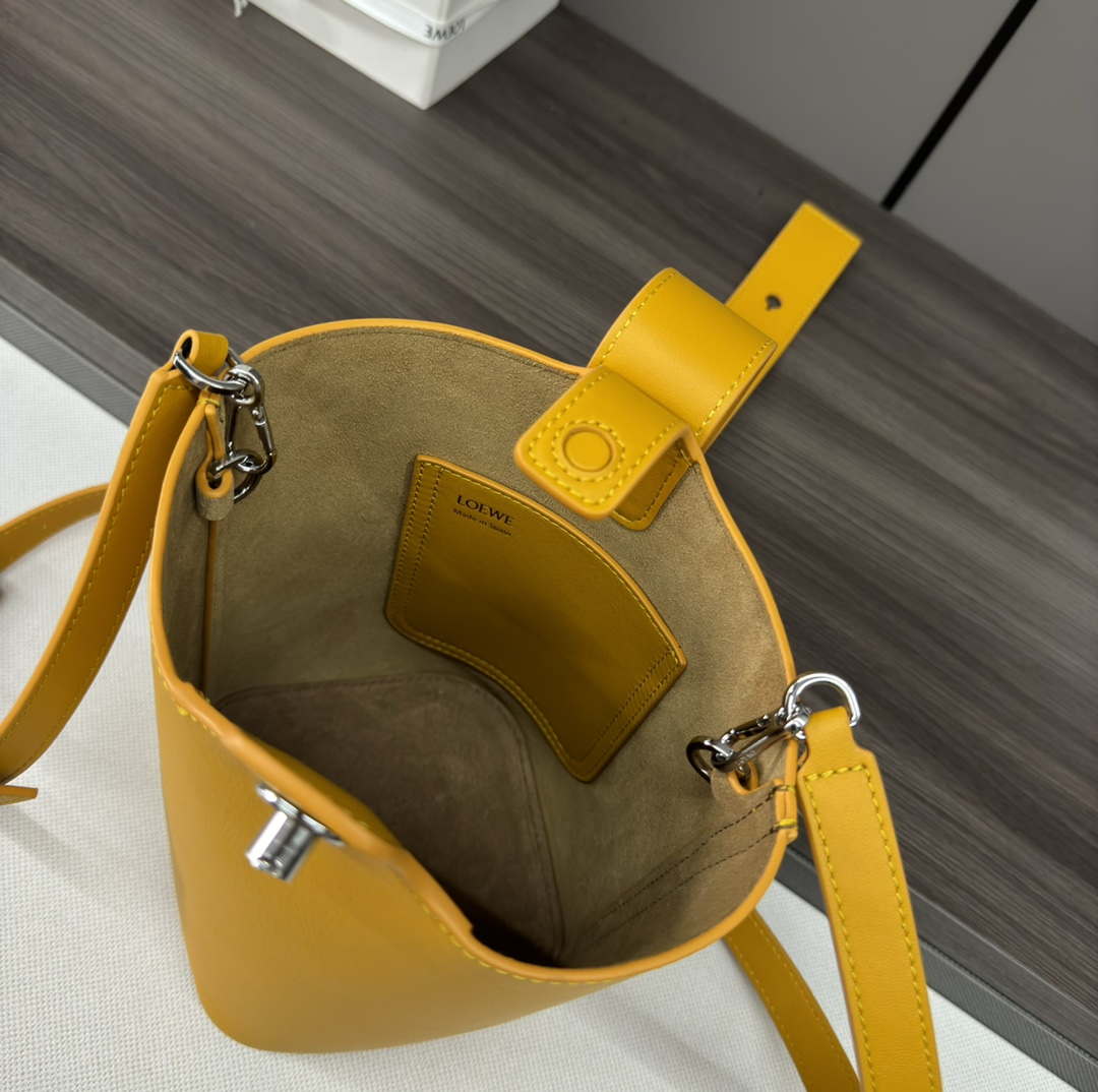Loewe AANBBBMX01 Mini Pebble Bucket Bag in mellow calfskin Yellow