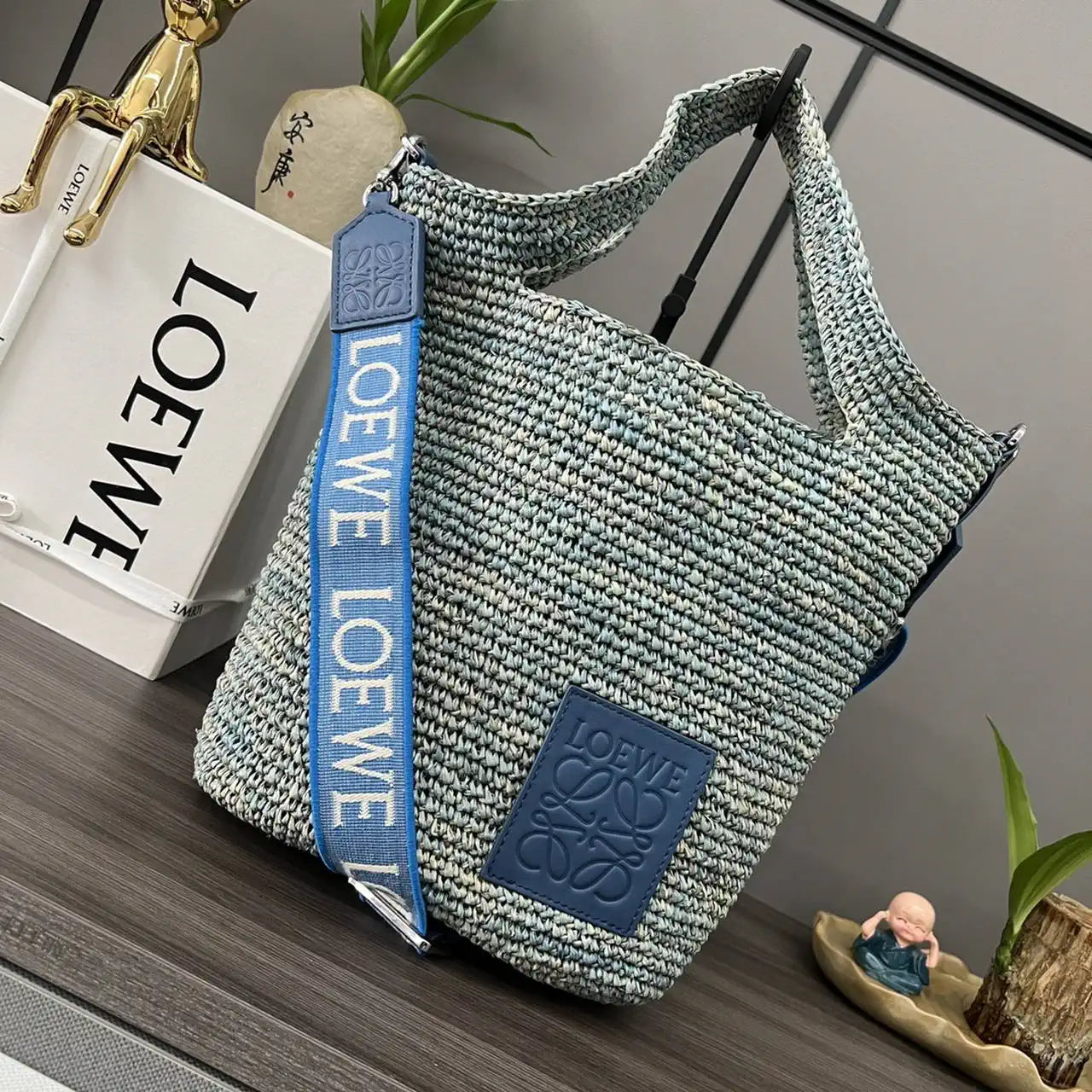 Loewe Slit pochette bag in raffia and calfskin 32824W10 Blue