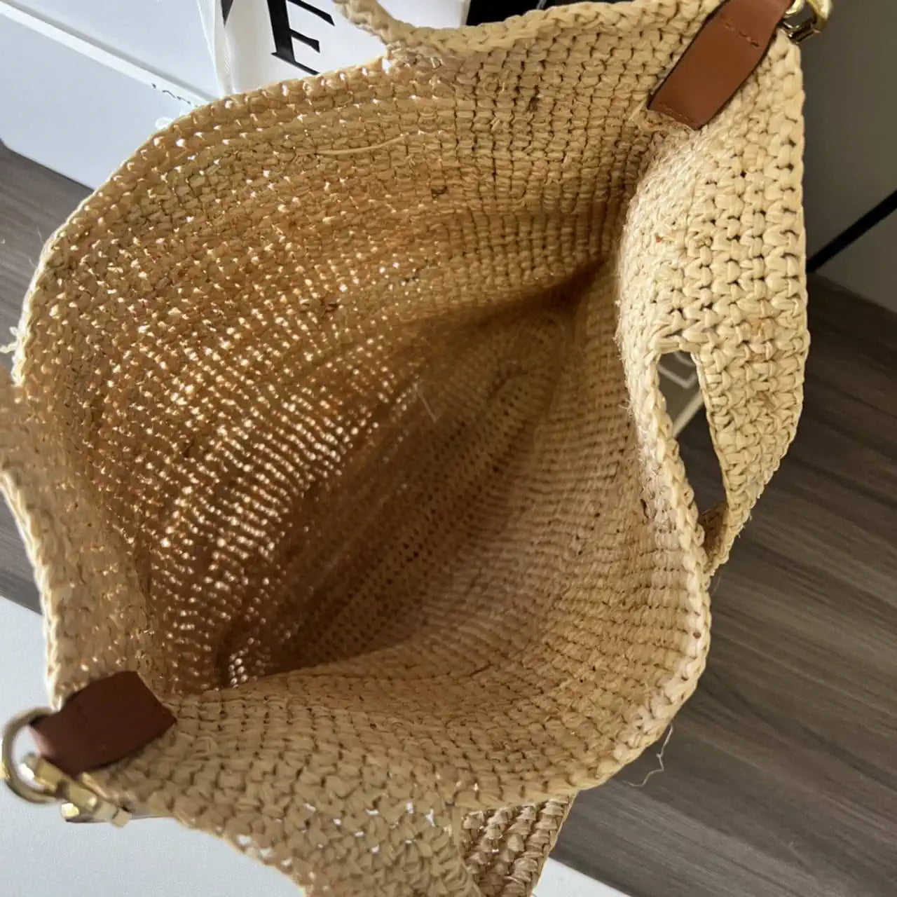Loewe Slit pochette bag in raffia and calfskin 32824W10