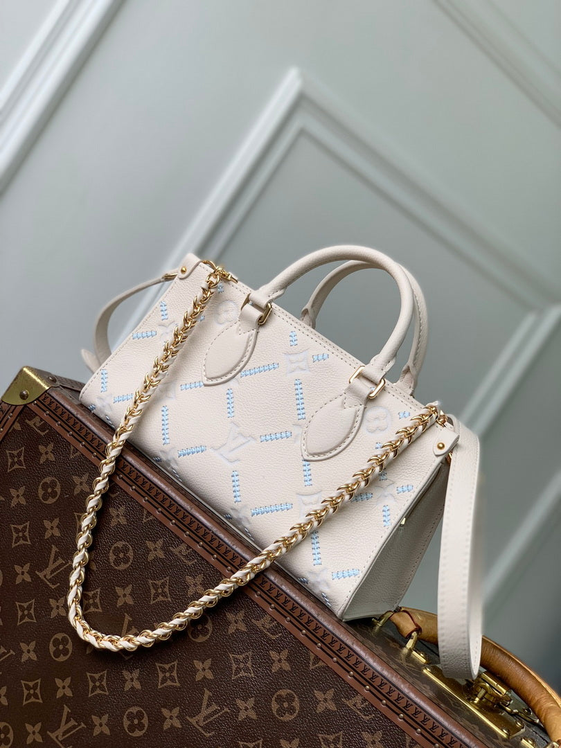 Louis Vuitton LV M29487 Onthego East West Bag Light Bliss Couture - Default Title - View 1