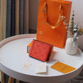 Louis Vuitton Multiple Wallet LV M80422 Monogram Shadow Leather Orange Red