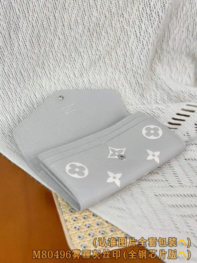 Louis Vuitton Sarah Wallet Bicolor Monogram Empreinte Leather LV M80496 Gray