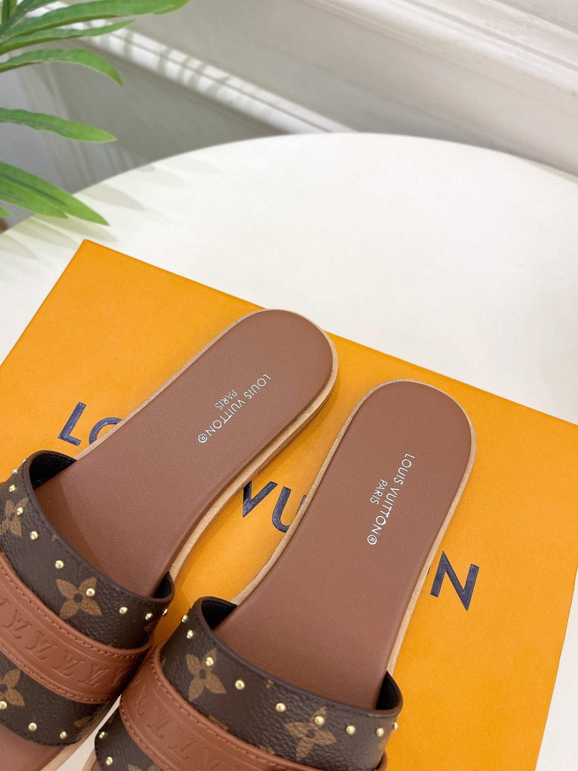 LV 1AAC3Y Louis Vuitton Lock It Flat Mules L99033