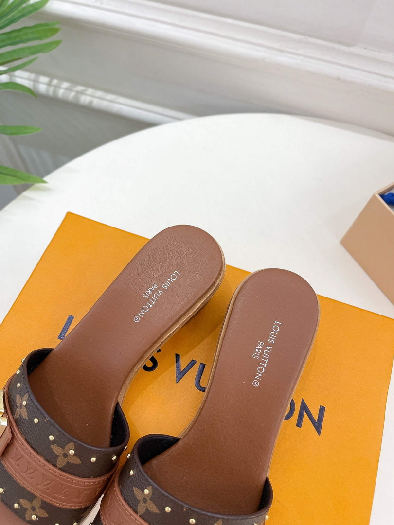 LV 1AADI2 Louis Vuitton Lock It Mules L99034