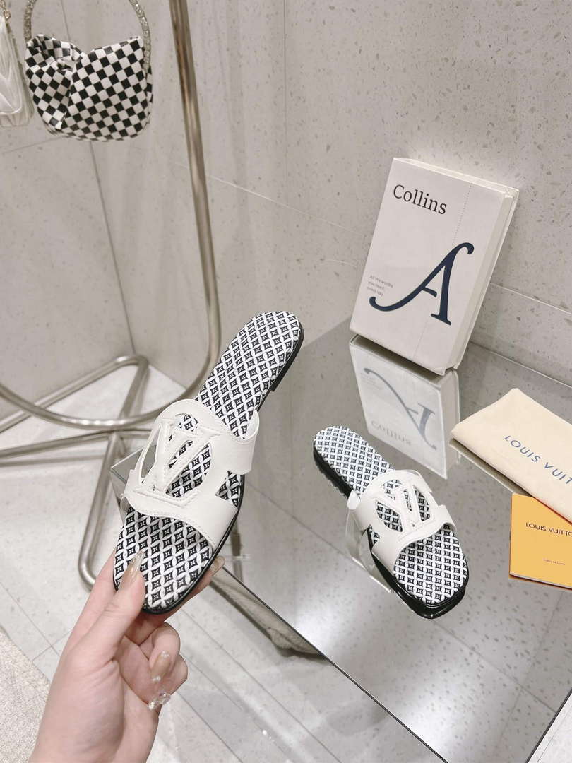 LV 1ABP20 Louis Vuitton LV Isola Flat Mules L66402