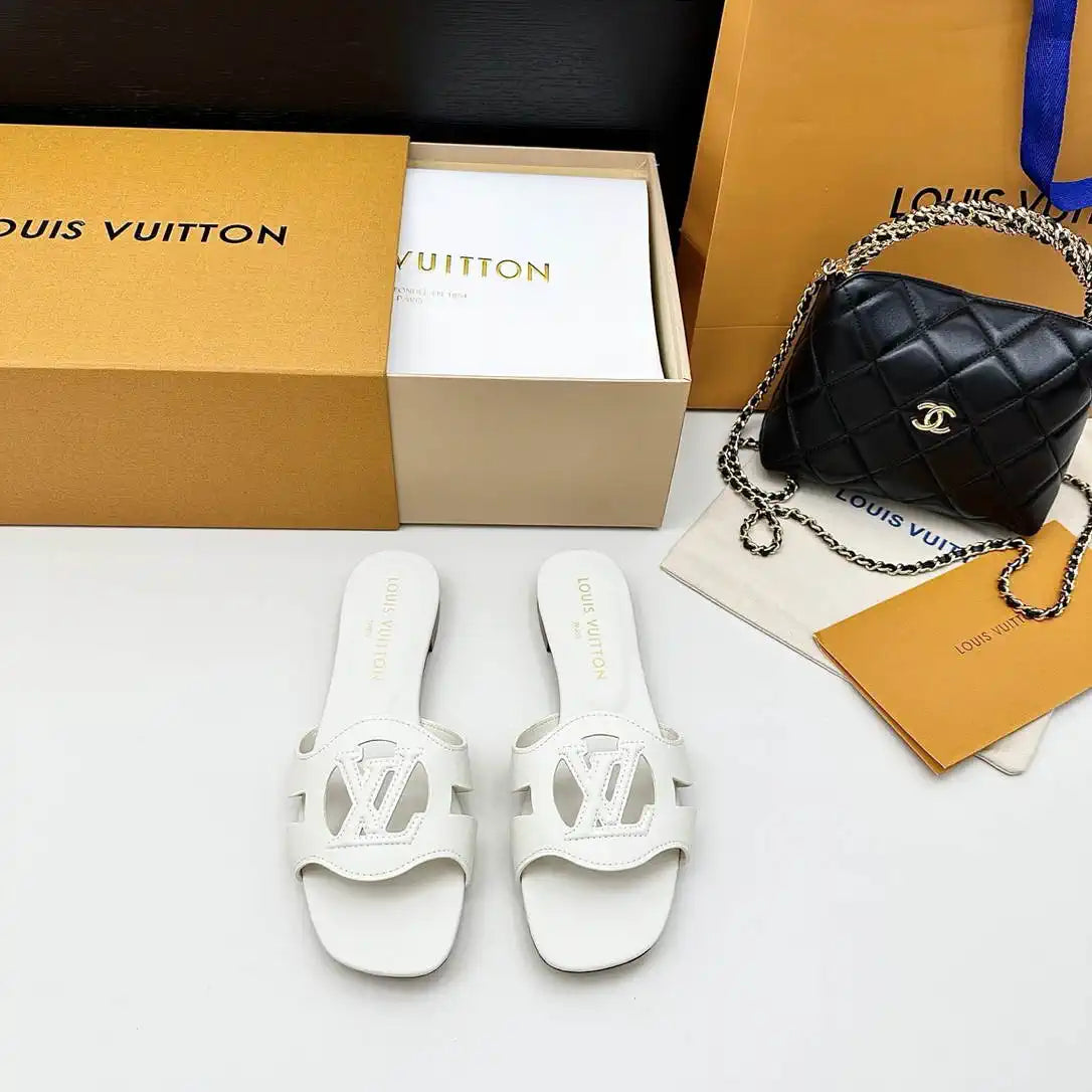LV 1ABP20 Louis Vuitton LV Isola Slippers Flat Mules L66450