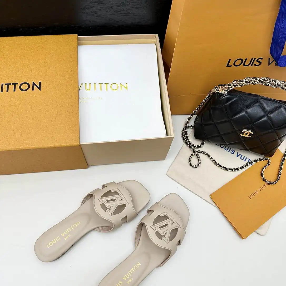 LV 1ABP20 Louis Vuitton LV Isola Slippers Flat Mules L66450