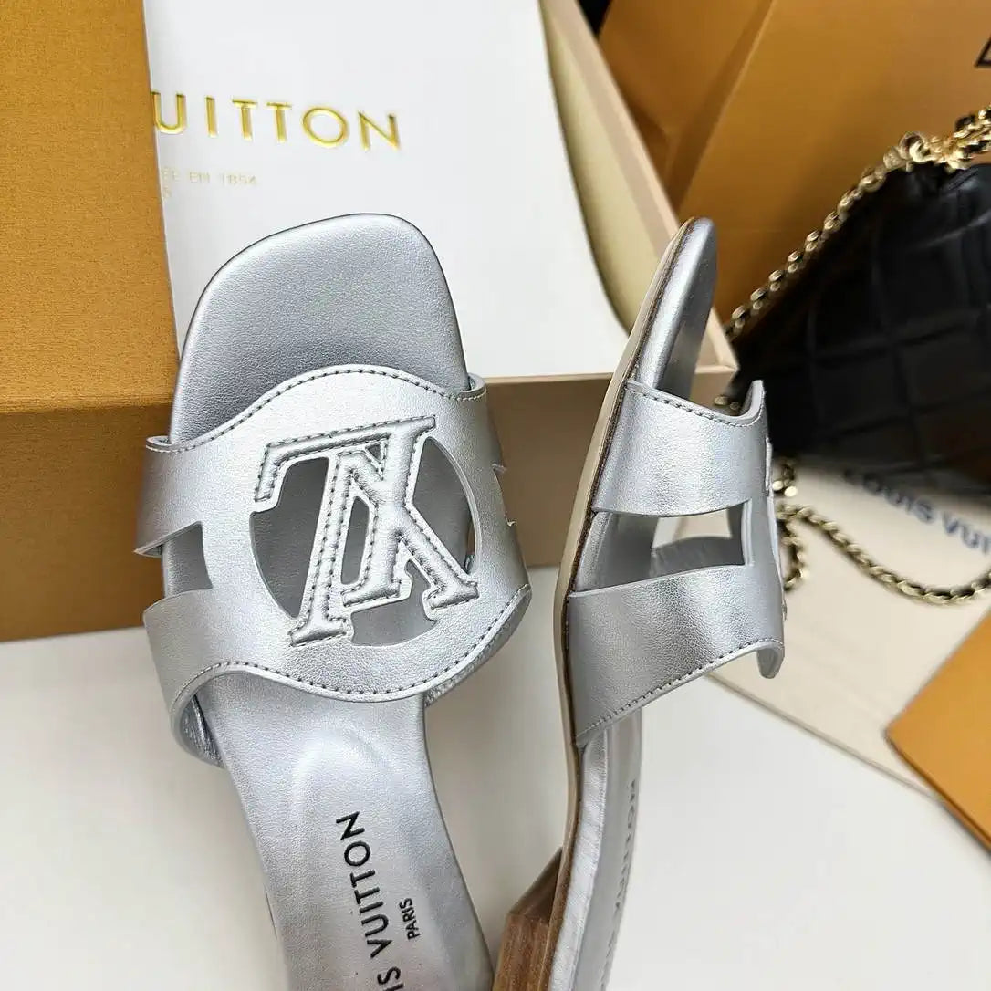 LV 1ABP20 Louis Vuitton LV Isola Slippers Flat Mules L66450