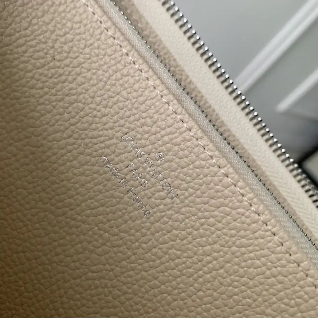 LV M12680 Louis Vuitton Zipper Wallet  Monogram Empreinte Beige