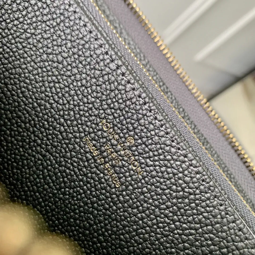 LV M12680 Louis Vuitton Zipper Wallet  Monogram Empreinte Pearl Gray