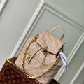 LV M13358 Louis Vuitton Coussin Backpack PM Galet - Default Title - View 1