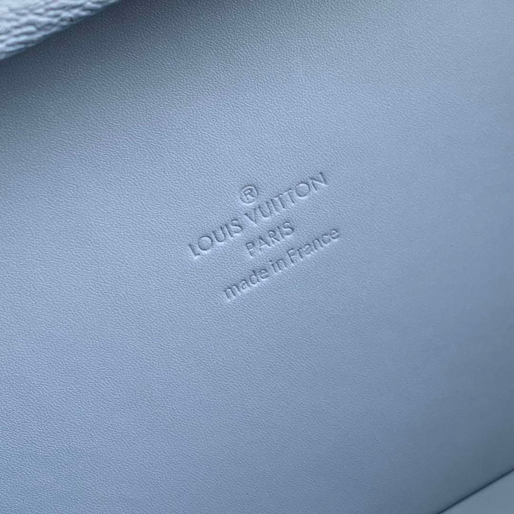 LV M13562 Louis Vuitton Wallet Trunk Taigarama Denim Blue