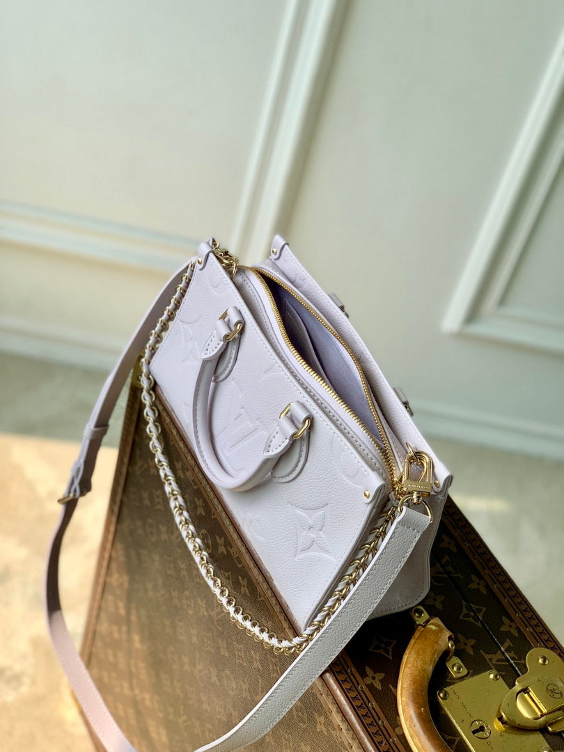 LV M15192 Louis Vuitton OnTheGo East West Bag Misty Lilac