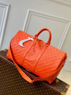 LV M20963 Louis Vuitton Keepall Bandouliere 50 Bag Orange - Default Title - View 1