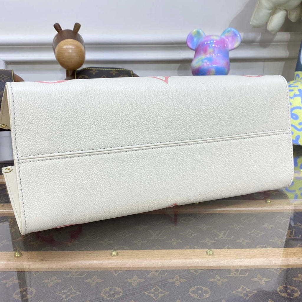 LV M21575 Louis Vuitton OnTheGo MM Bicolor Monogram Empreinte Leather Latte Pink