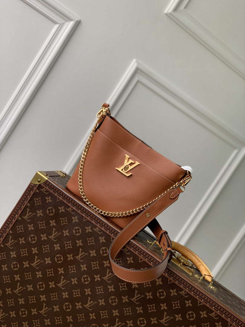 LV M24165 Louis Vuitton Lock and Walk Bucket Bag Cognac Brown - Default Title - View 1